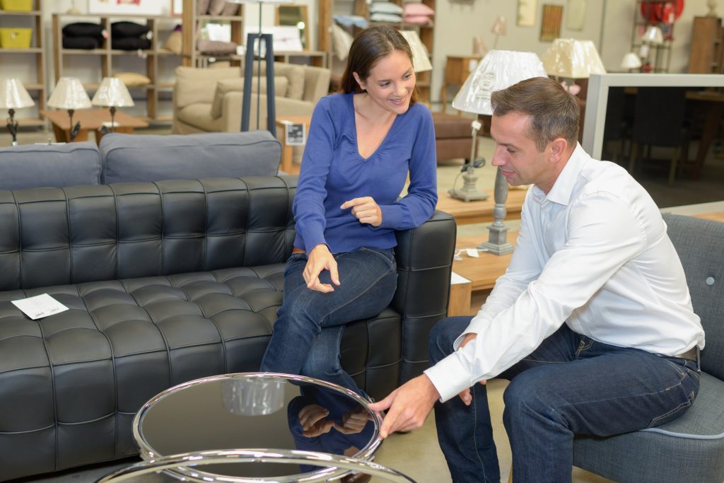 sexual tension between a couple in a furniture store